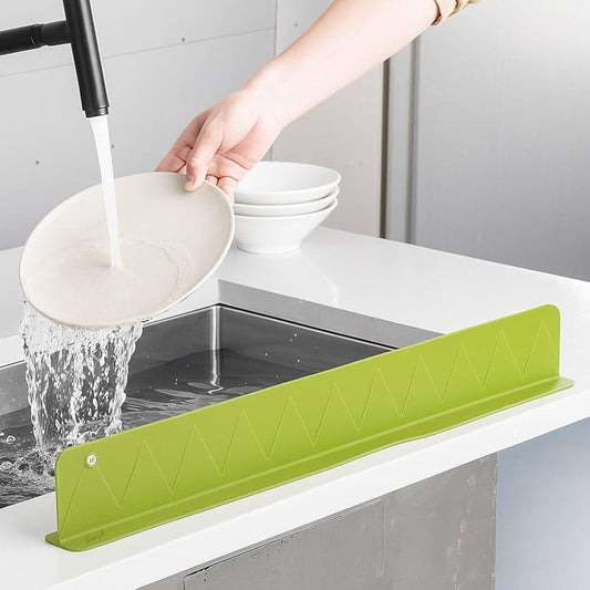 16-inch silicone sink splash guard installed on a kitchen sink