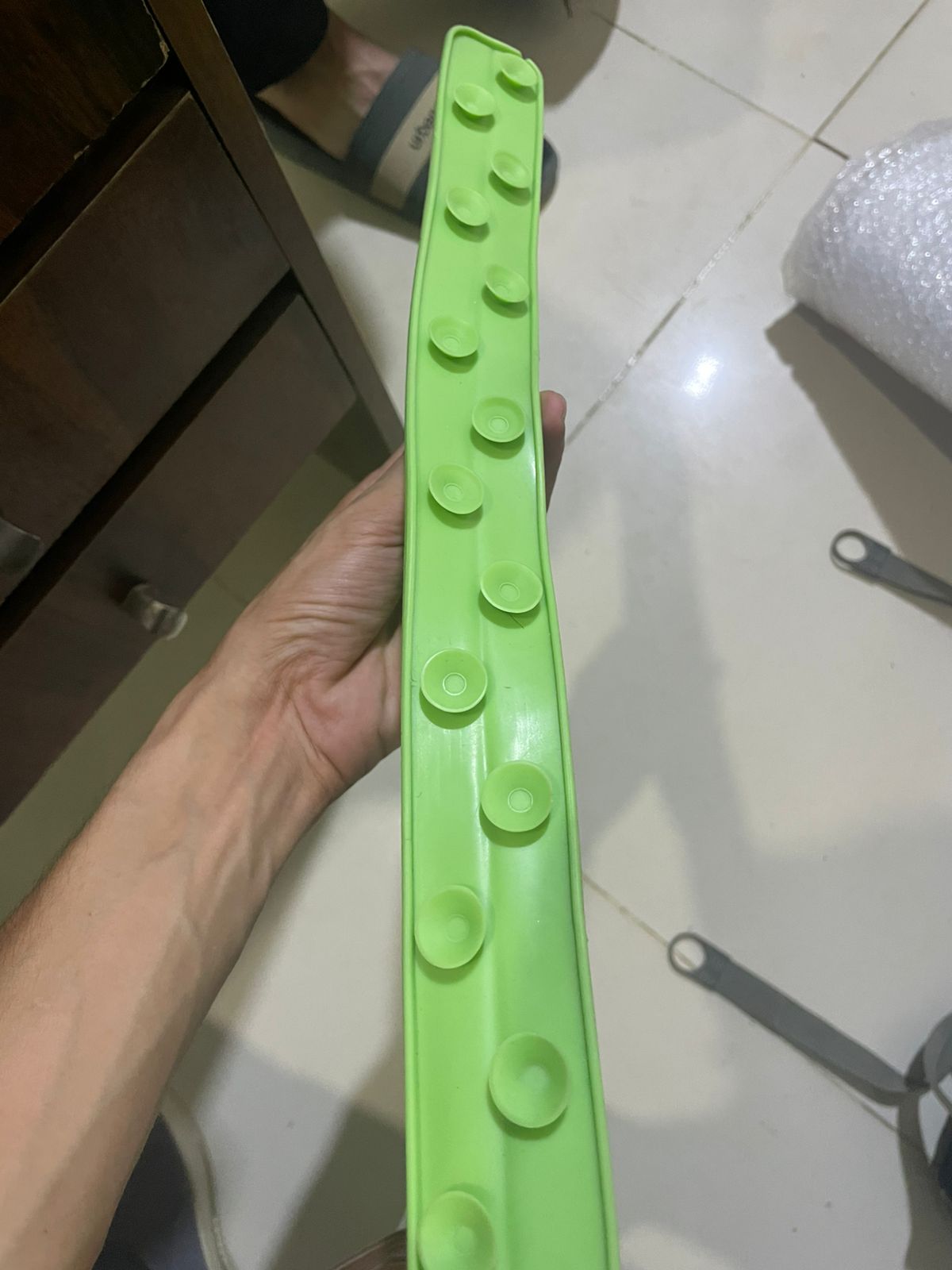 Suction cups on the underside of the silicone splash guard