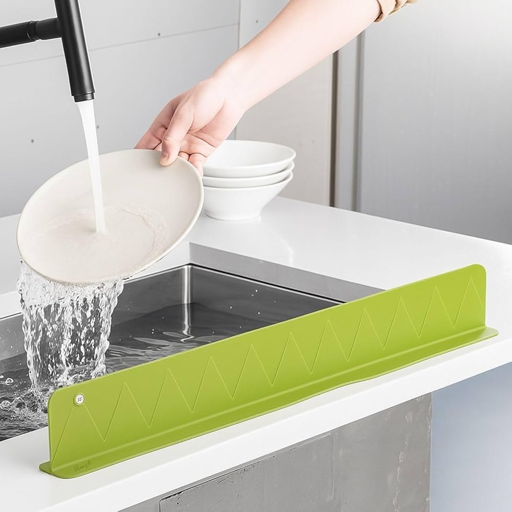 Kitchen countertop kept dry with the silicone sink splash guard in place